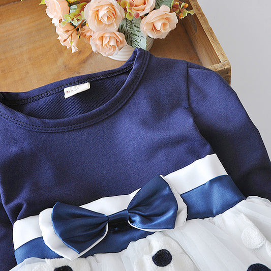 Robe à manches longues avec nœud fleuri
