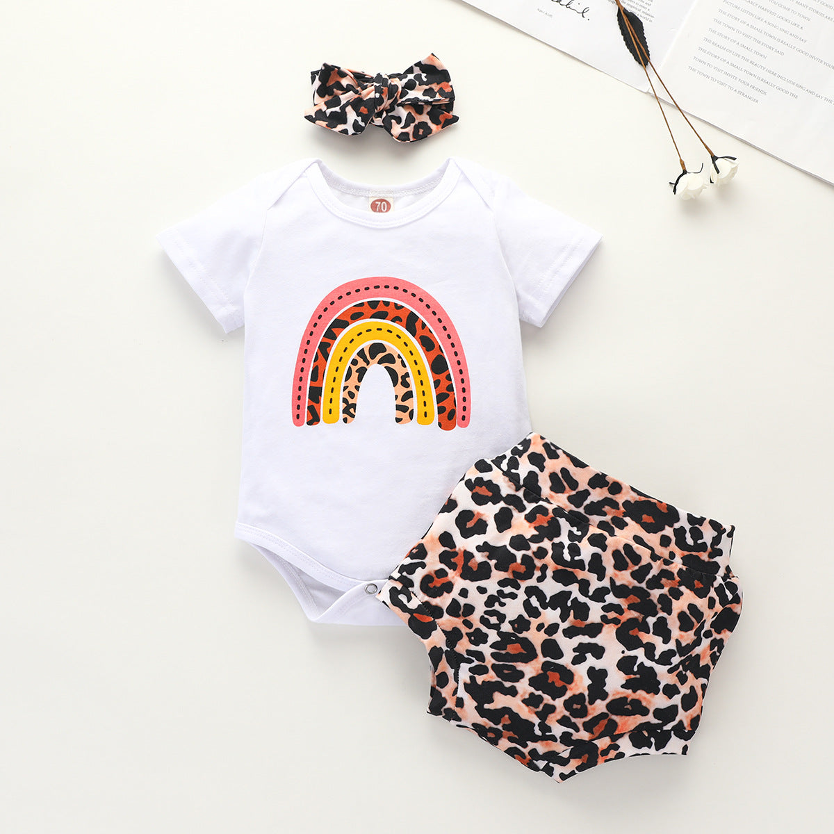 Grenouillère arc-en-ciel pour petites filles