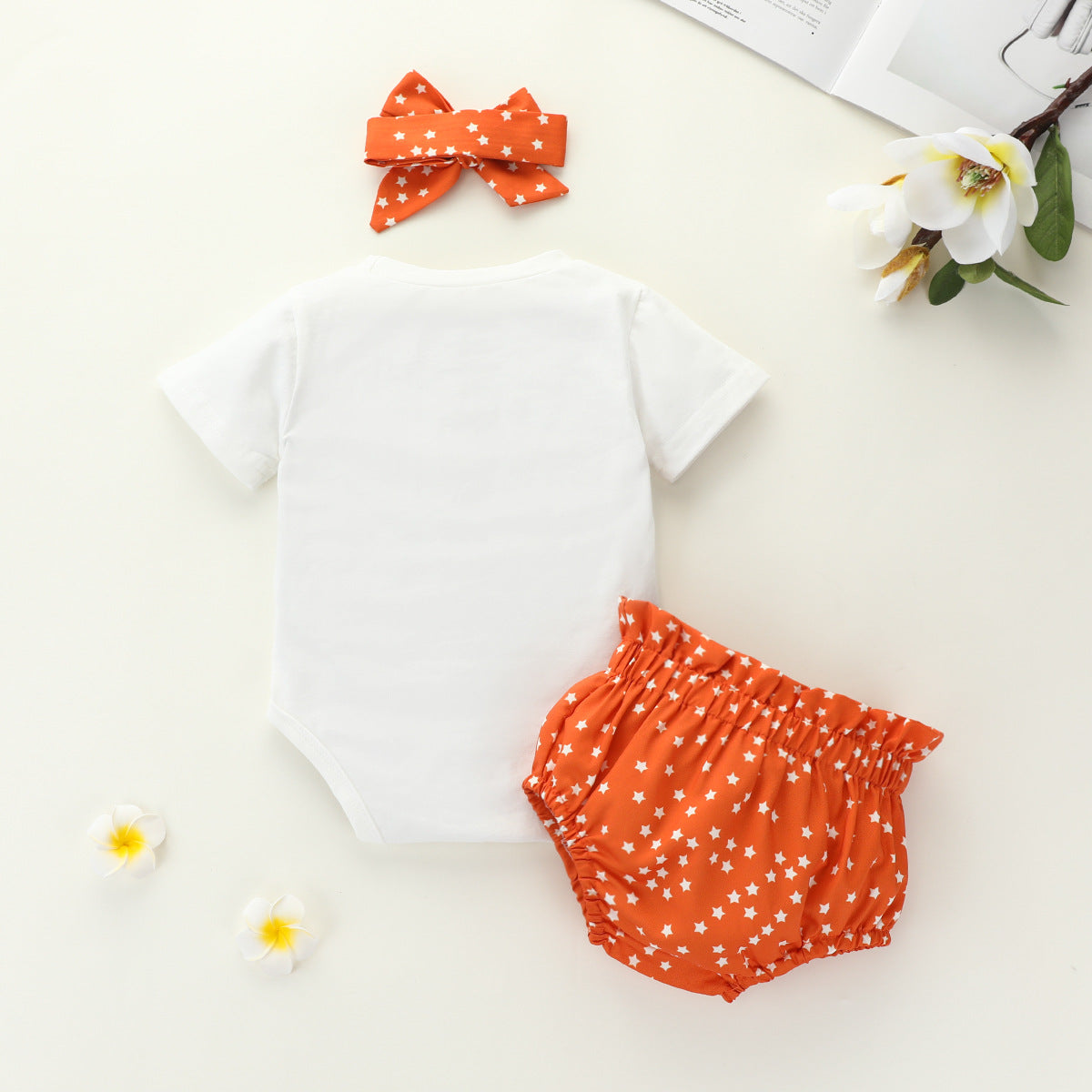 Grenouillère arc-en-ciel pour petites filles