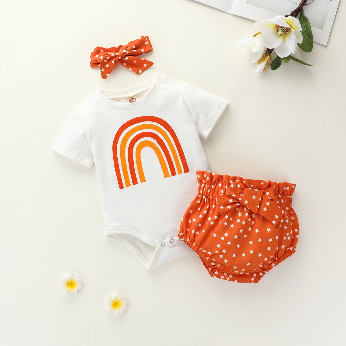 Grenouillère arc-en-ciel pour petites filles