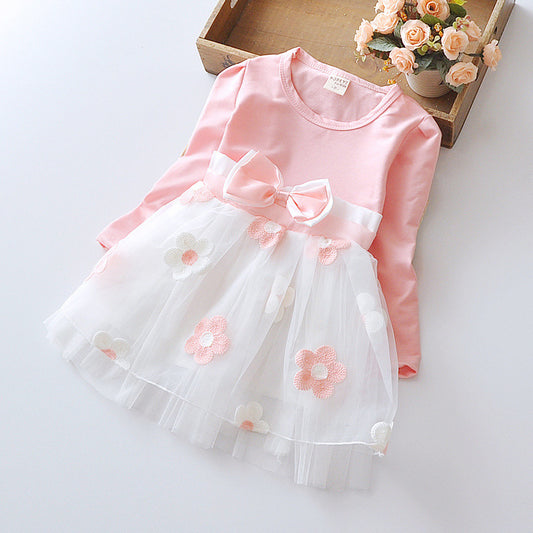 Robe à manches longues avec nœud fleuri