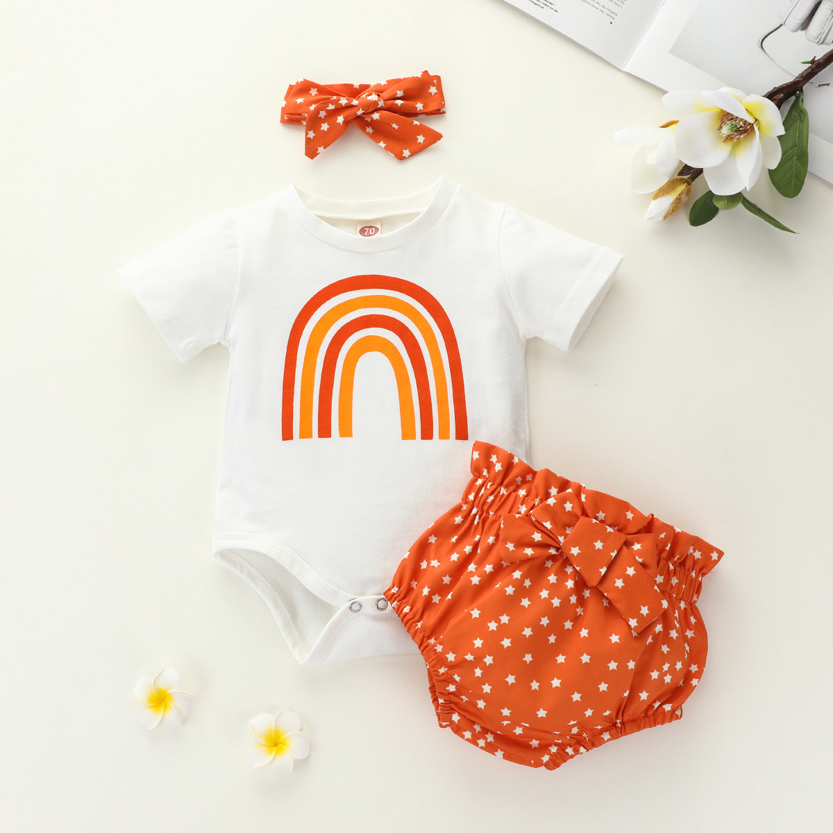 Grenouillère arc-en-ciel pour petites filles