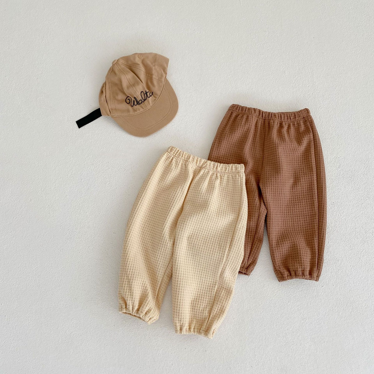 Pantalon ample et polyvalent pour enfants en tissu gaufré